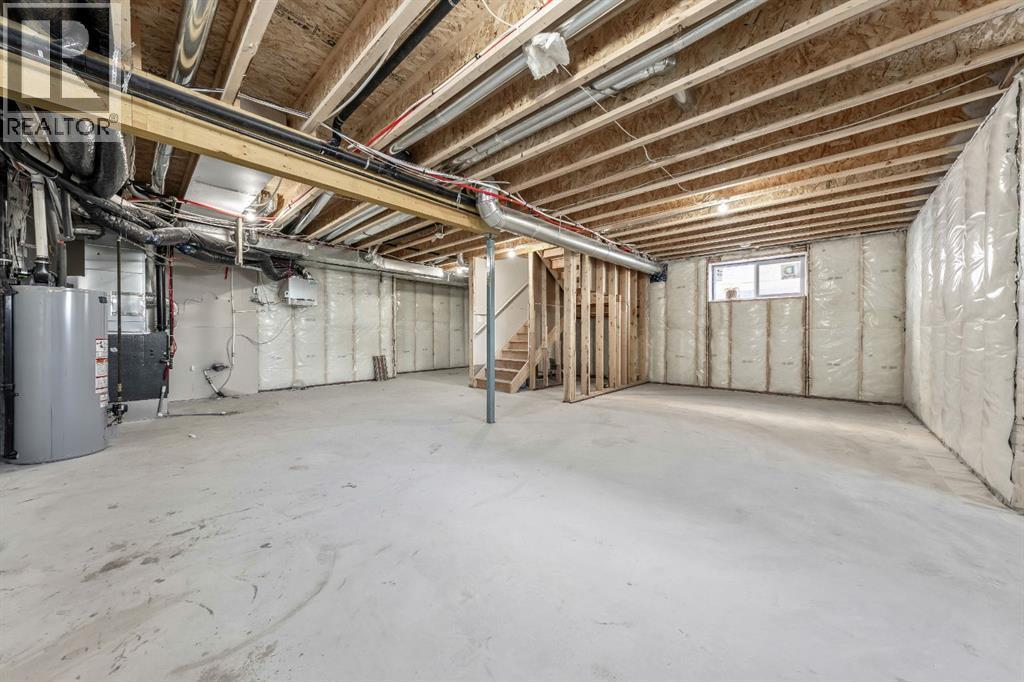 Open, undeveloped basement - 27 Bridges Drive, Langdon, AB - Indoor Photo Showing Basement