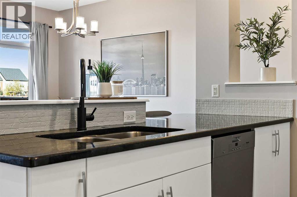 26 Chaparral Valley Common Se, Calgary, AB - Indoor Photo Showing Kitchen With Double Sink