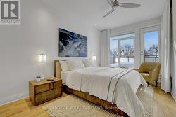 3rd. fl. primary bedroom with entry to deck -