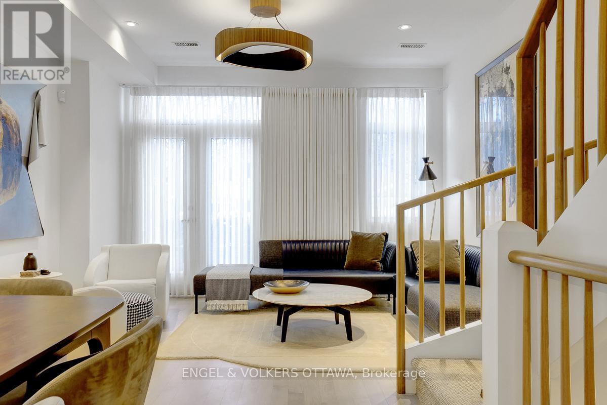 Brazilian walnut uplight/downlight ceiling fixture - 449 Edison Avenue, Ottawa, ON - Indoor