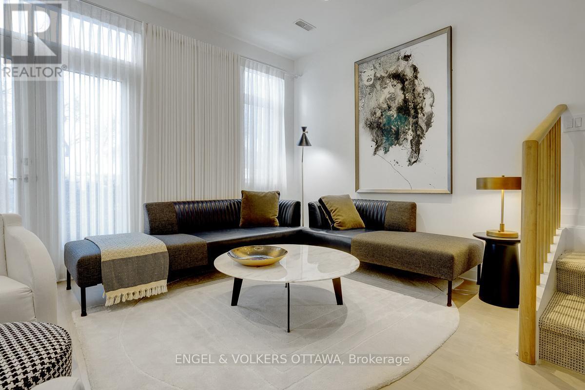 Living room with entry to front deck - 449 Edison Avenue, Ottawa, ON - Indoor Photo Showing Living Room