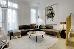 Living room with entry to front deck -