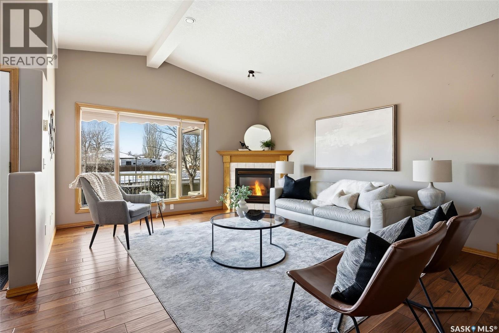2906 St James Crescent, Regina, SK - Indoor Photo Showing Living Room With Fireplace
