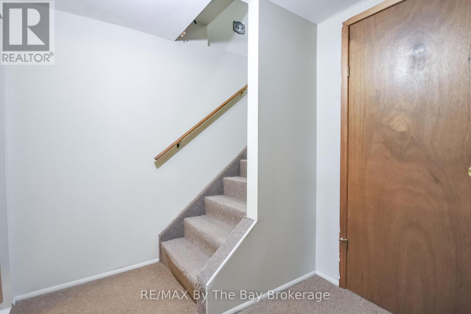 Stairs to Finished Basement - 464 William Street, Midland, ON - Indoor Photo Showing Other Room