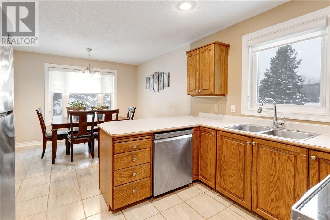 76 Hesta Street, Dowling, ON - Indoor Photo Showing Kitchen With Double Sink