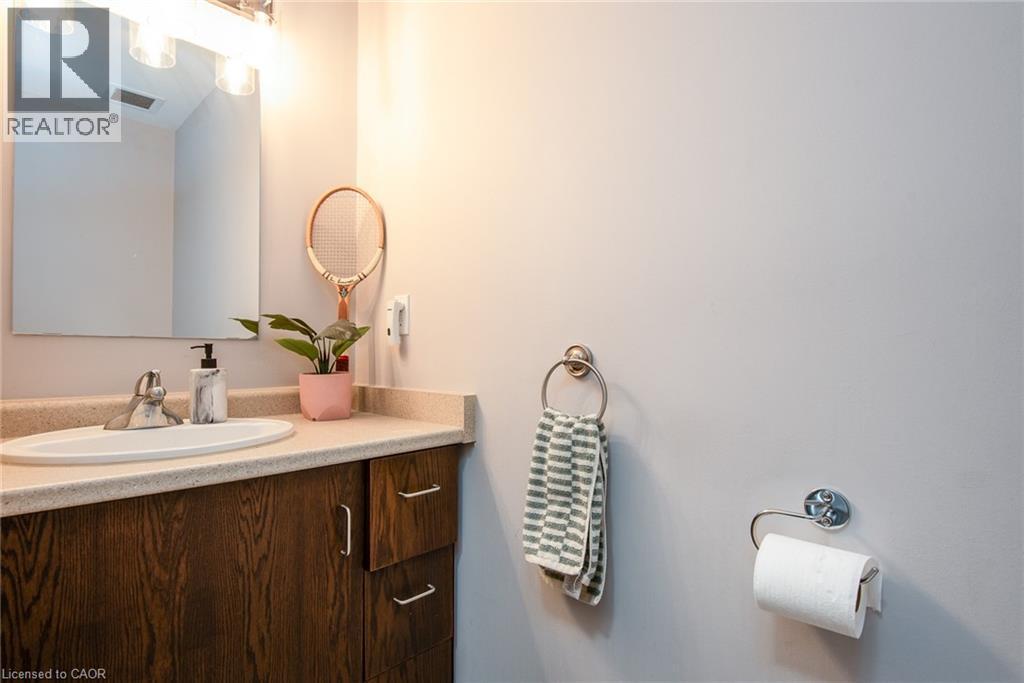 Two piece powder room. - 191 King Street S Unit# 702, Waterloo, ON - Indoor Photo Showing Bathroom