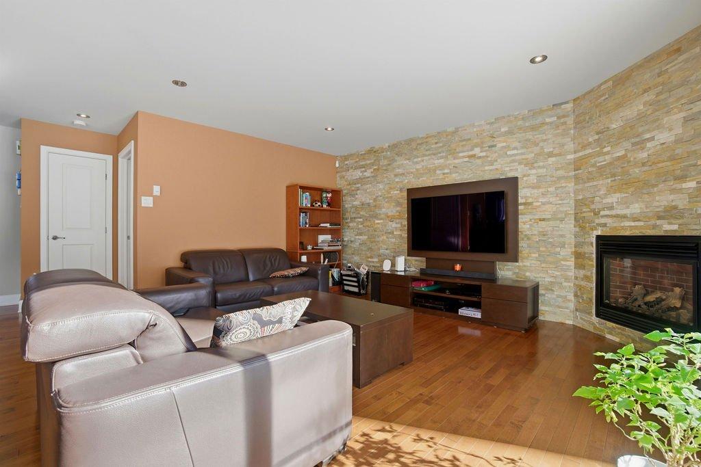 Living room - 1447 Boul. Maisonneuve, Saint-Jérôme, QC - Indoor Photo Showing Living Room With Fireplace