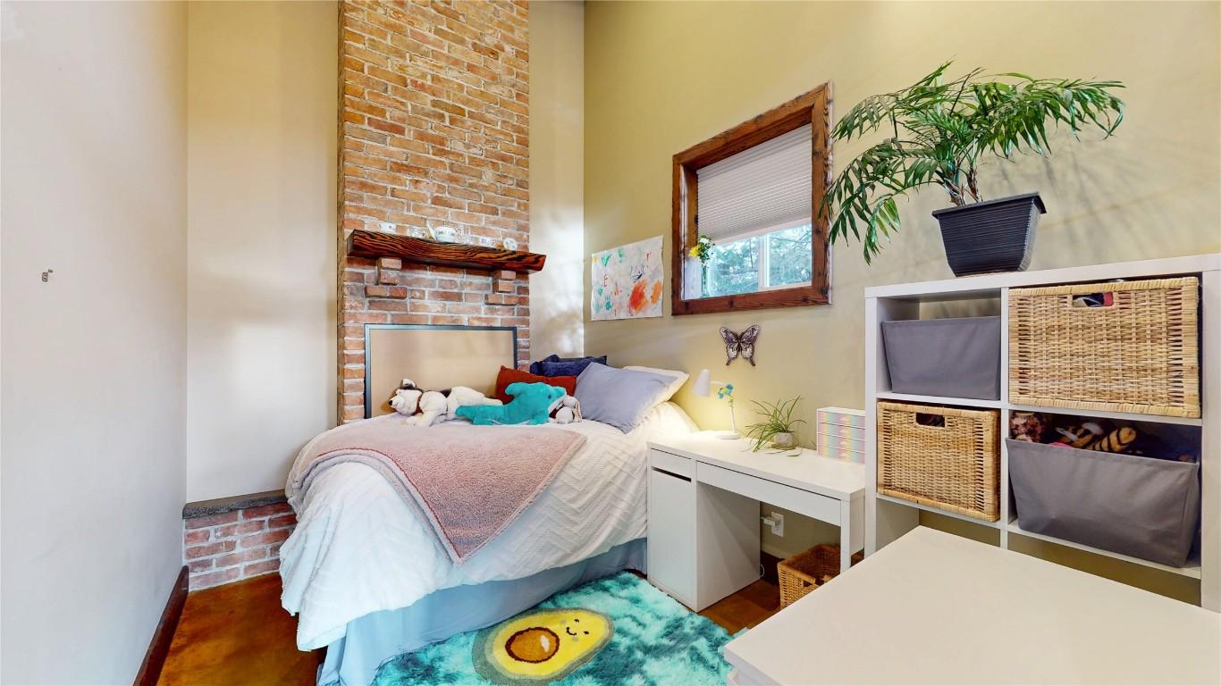 166 304Th Avenue, Kimberley, BC - Indoor Photo Showing Bedroom With Fireplace