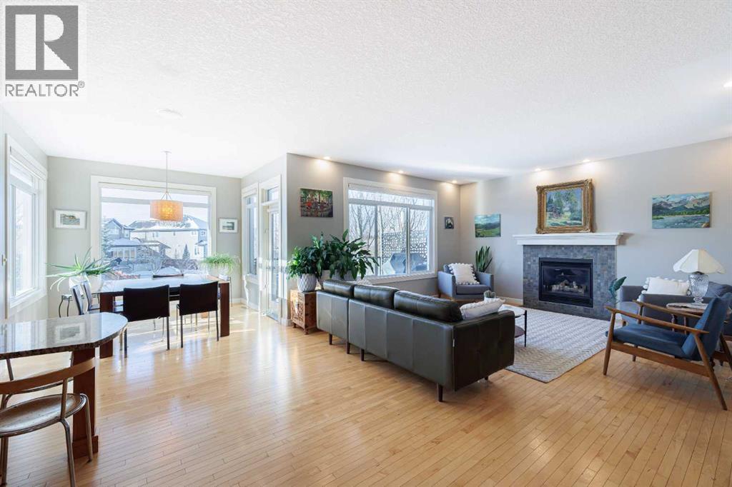 98 Tuscany Estates Crescent Nw, Calgary, AB - Indoor Photo Showing Living Room With Fireplace