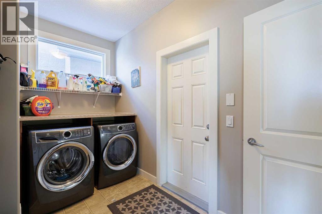 98 Tuscany Estates Crescent Nw, Calgary, AB - Indoor Photo Showing Laundry Room