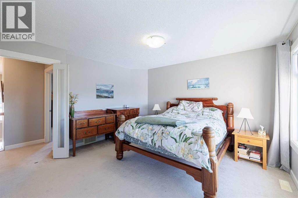 98 Tuscany Estates Crescent Nw, Calgary, AB - Indoor Photo Showing Bedroom