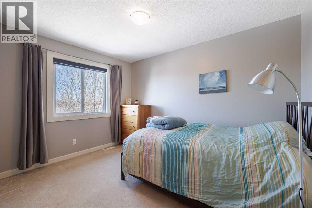98 Tuscany Estates Crescent Nw, Calgary, AB - Indoor Photo Showing Bedroom