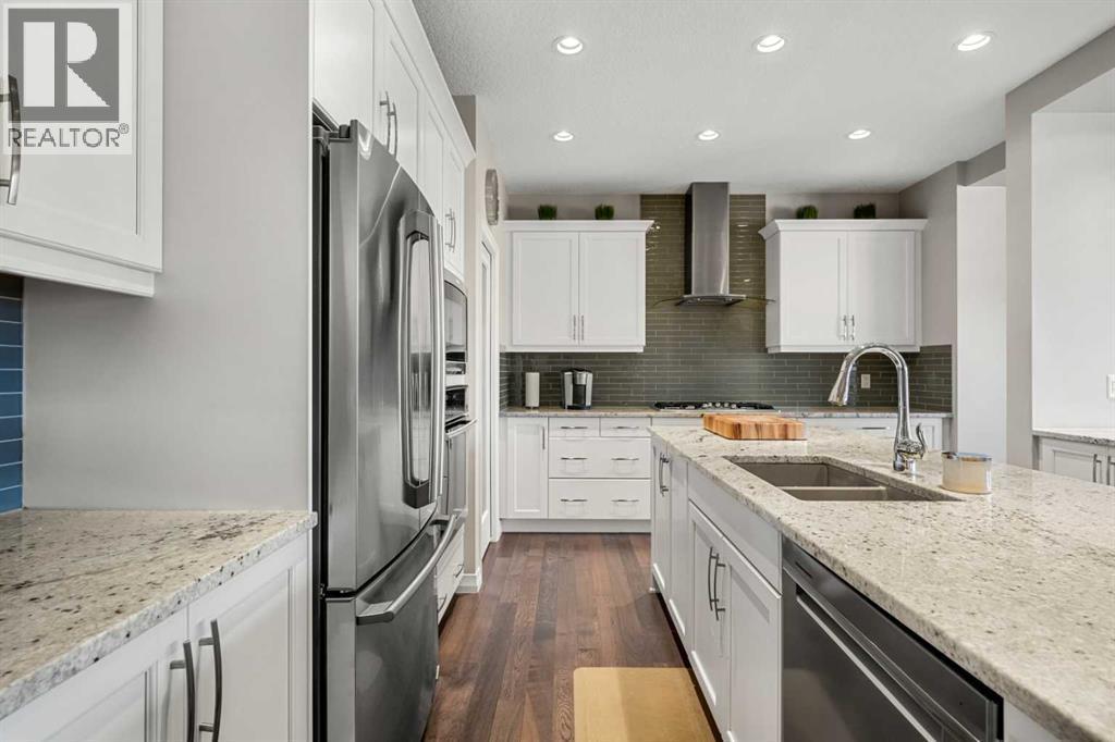 206 Mahogany Passage Se, Calgary, AB - Indoor Photo Showing Kitchen With Double Sink With Upgraded Kitchen