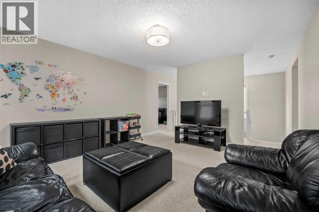 206 Mahogany Passage Se, Calgary, AB - Indoor Photo Showing Living Room