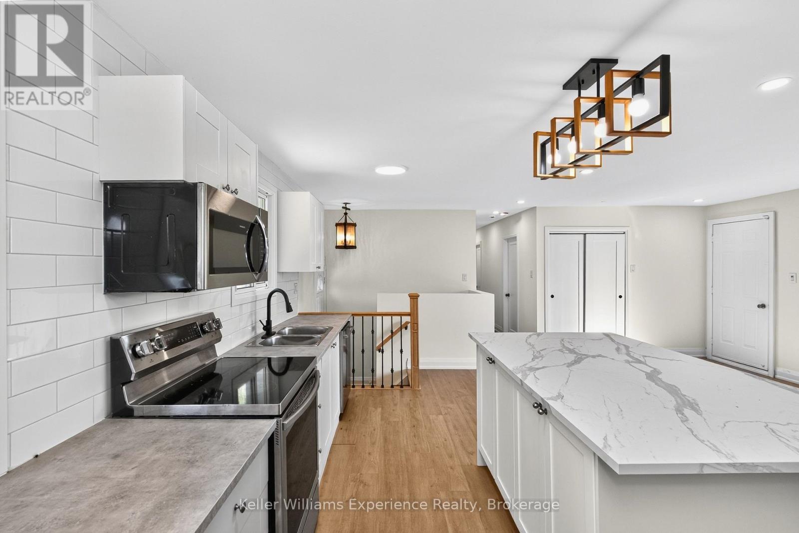 556 Champlain Road, Tiny, ON - Indoor Photo Showing Kitchen With Double Sink