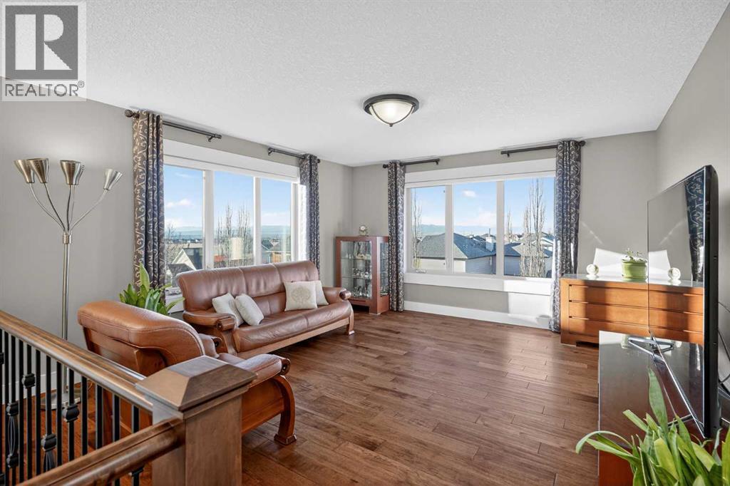 72 Rockcliff Grove Nw, Calgary, AB - Indoor Photo Showing Living Room