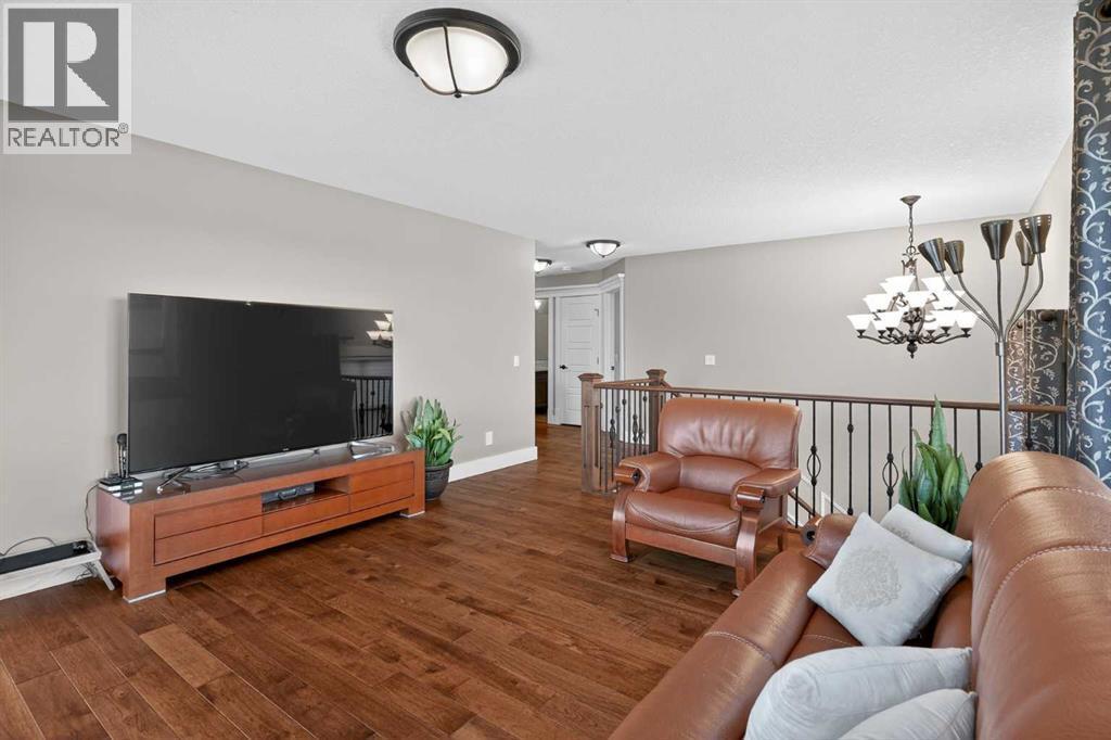 72 Rockcliff Grove Nw, Calgary, AB - Indoor Photo Showing Living Room