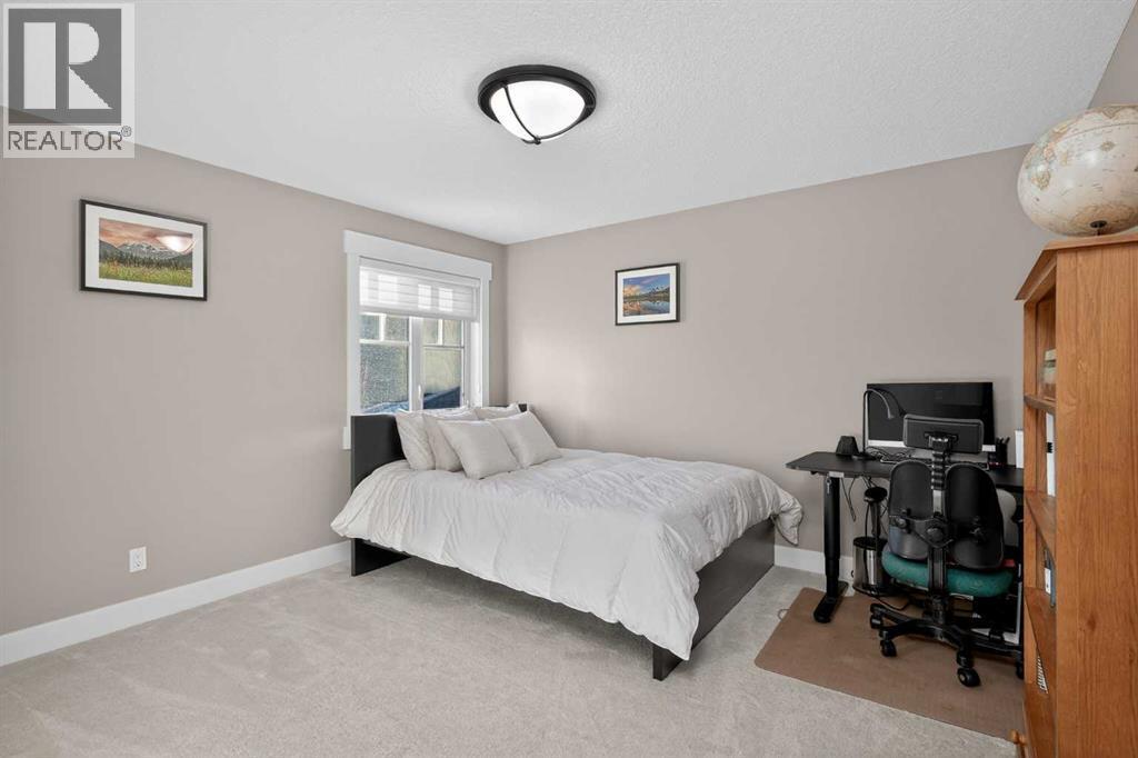 72 Rockcliff Grove Nw, Calgary, AB - Indoor Photo Showing Bedroom