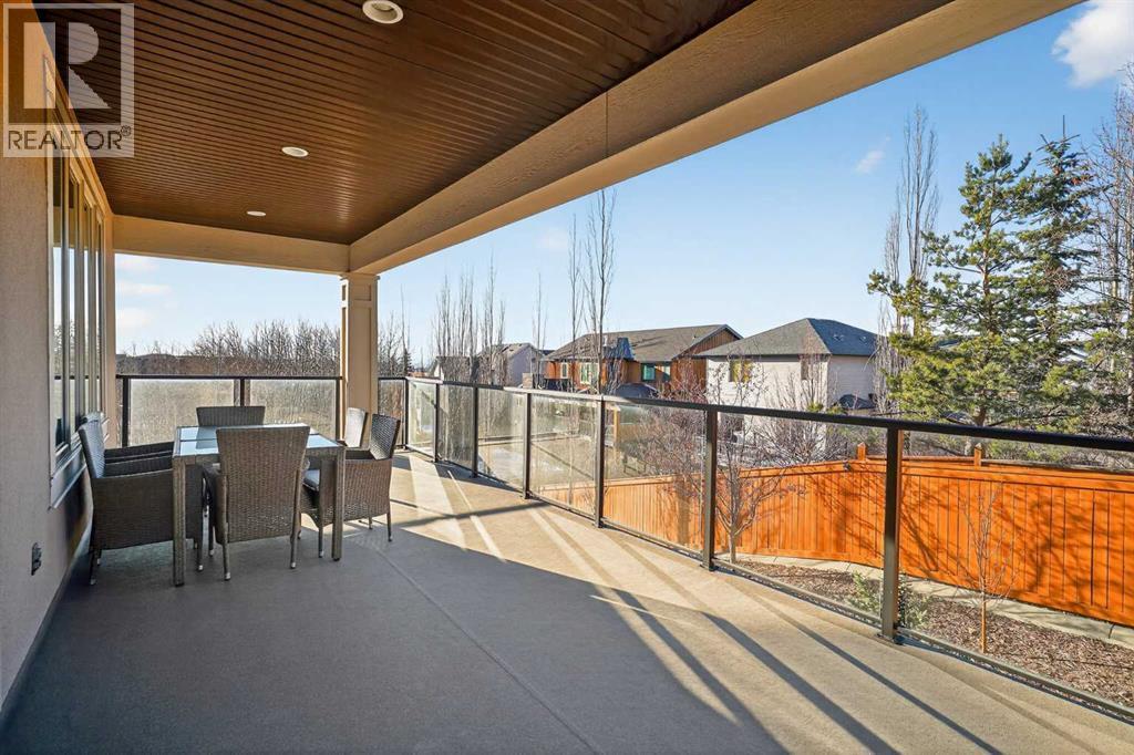 Finished Walk Out basement - 72 Rockcliff Grove Nw, Calgary, AB - Outdoor With Balcony With Exterior