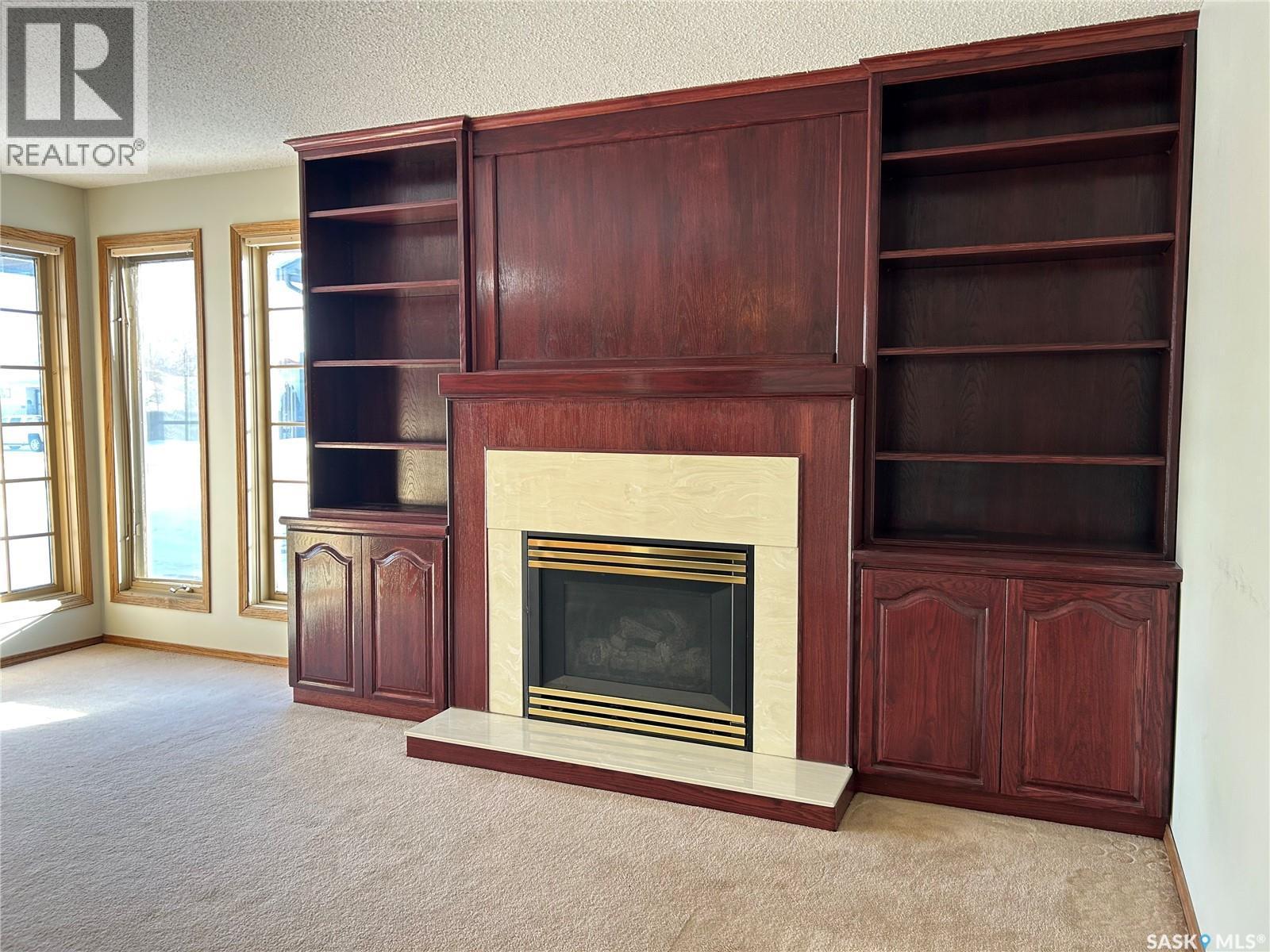 1475 Mather Crescent, Estevan, SK - Indoor With Fireplace