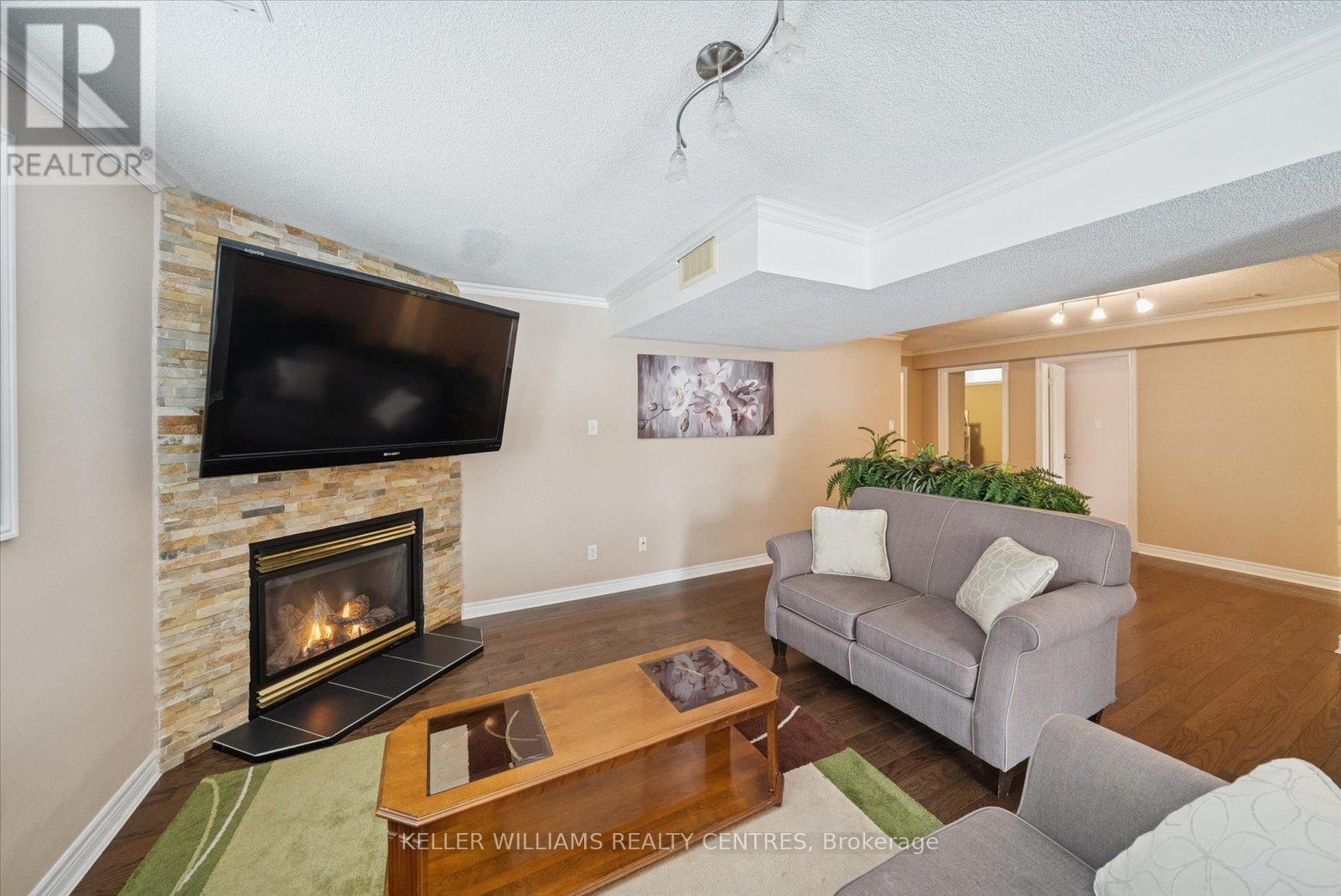76 Kerfoot Street, Georgina, ON - Indoor Photo Showing Living Room With Fireplace