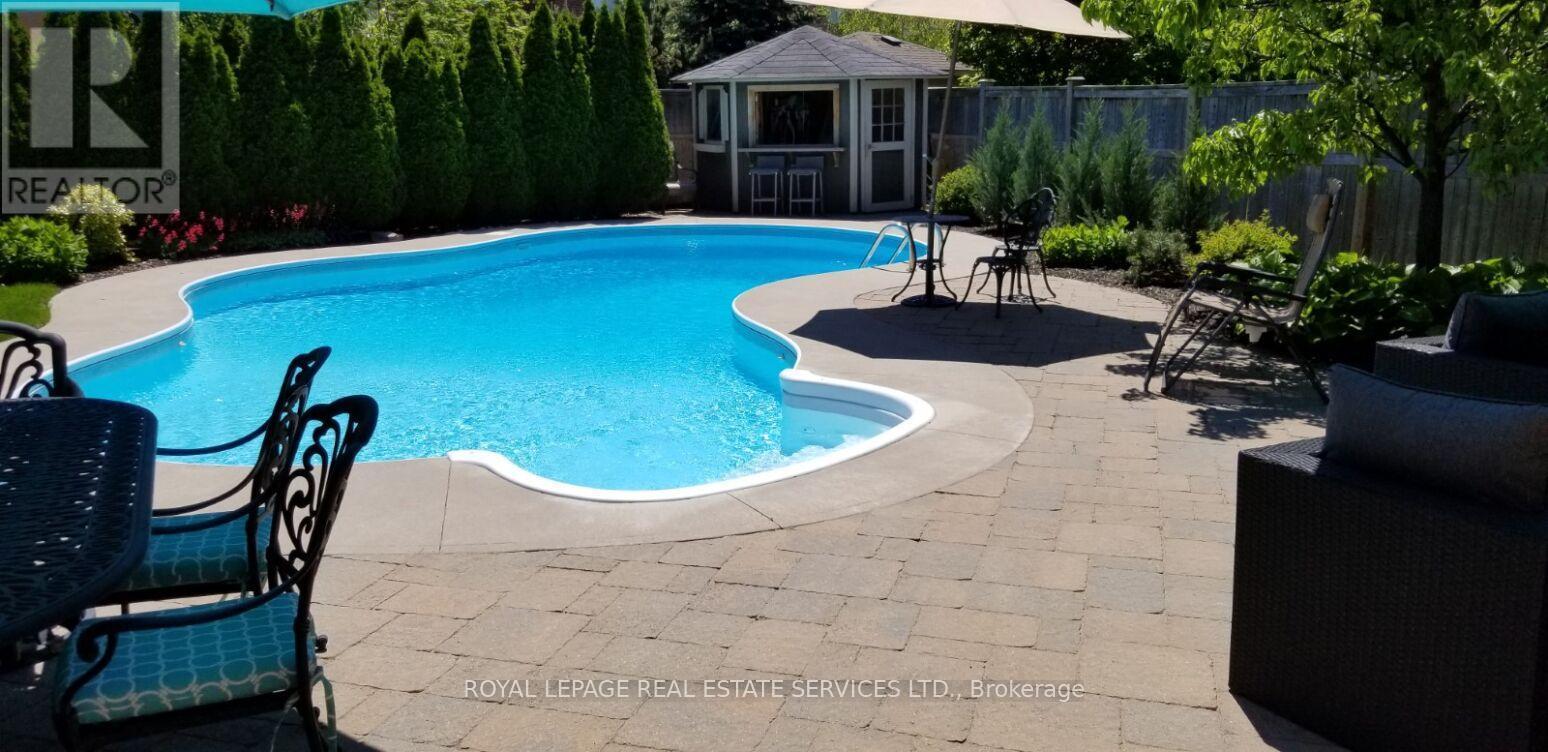 2275 Littondale Lane, Oakville, ON - Outdoor With In Ground Pool With Deck Patio Veranda