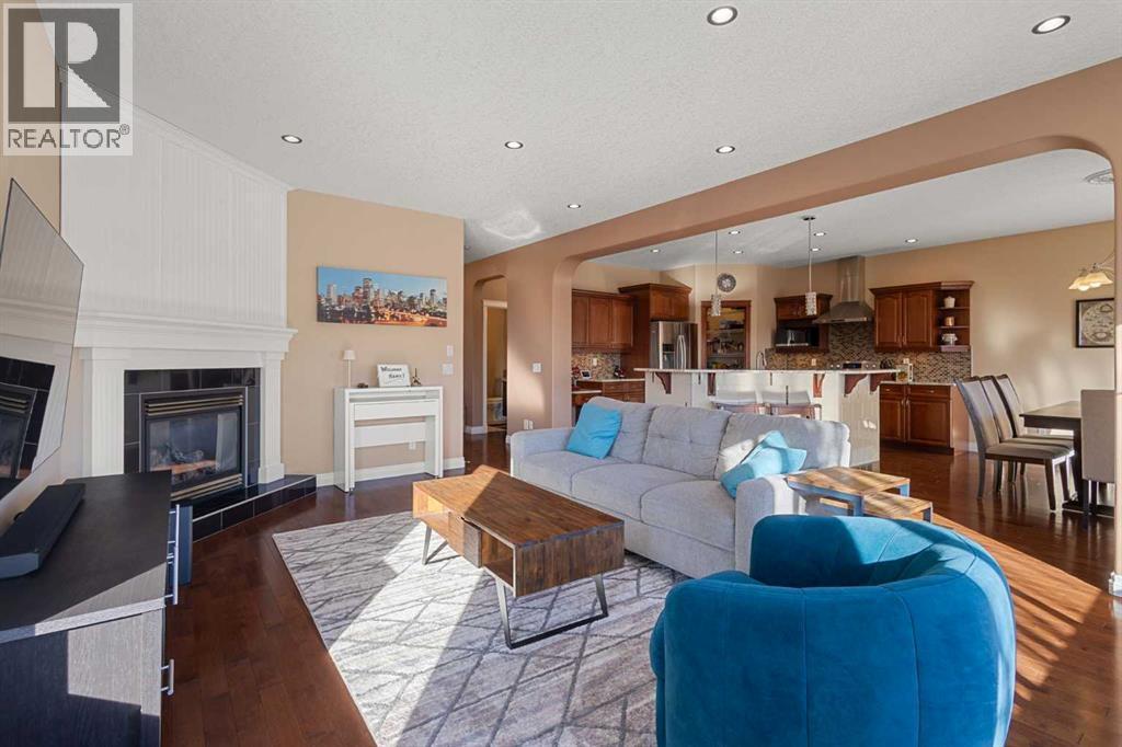 157 Hidden Creek Road Nw, Calgary, AB - Indoor Photo Showing Living Room With Fireplace
