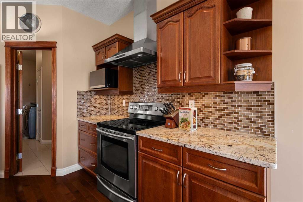 157 Hidden Creek Road Nw, Calgary, AB - Indoor Photo Showing Kitchen