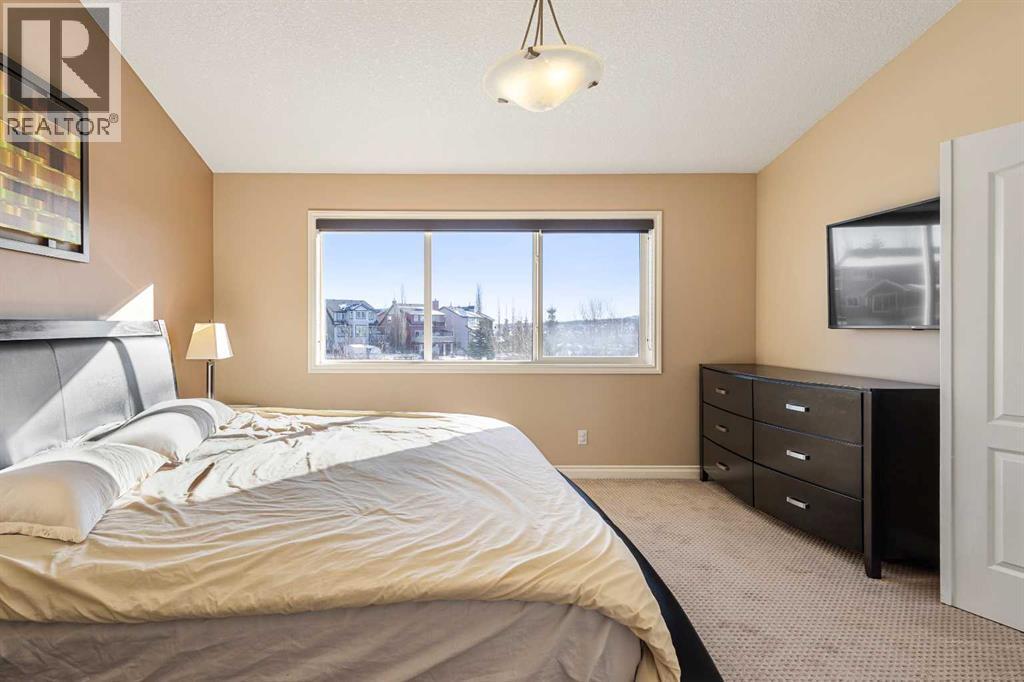 157 Hidden Creek Road Nw, Calgary, AB - Indoor Photo Showing Bedroom
