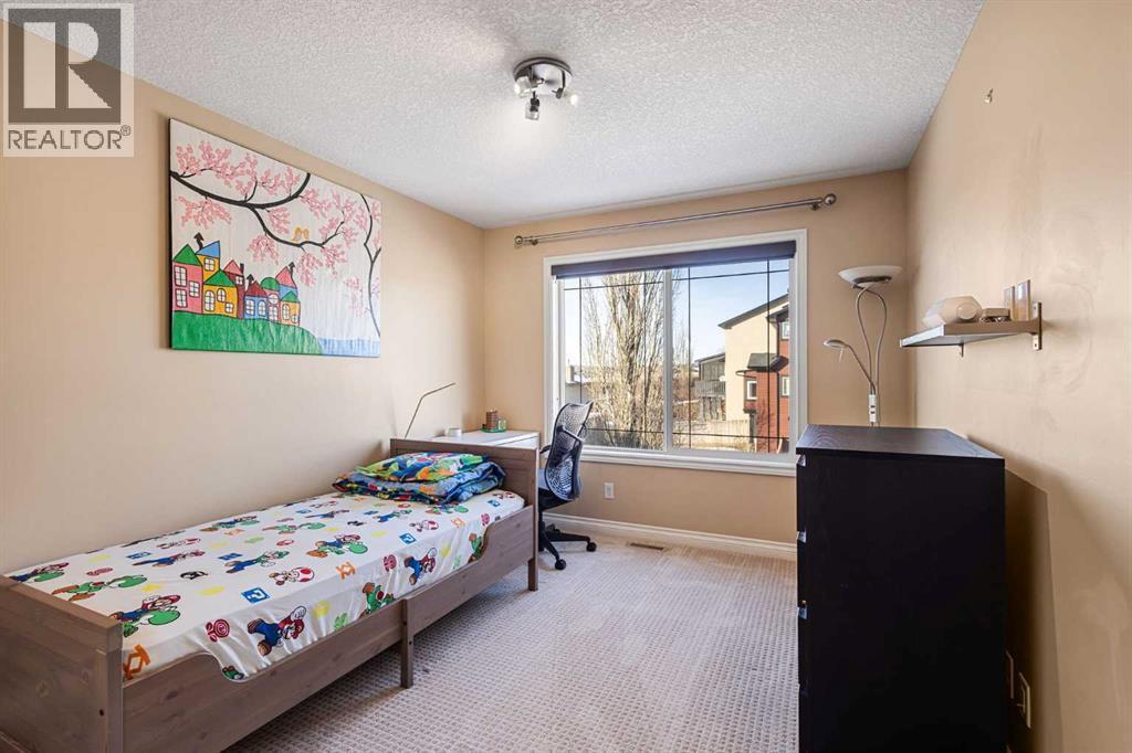 157 Hidden Creek Road Nw, Calgary, AB - Indoor Photo Showing Bedroom