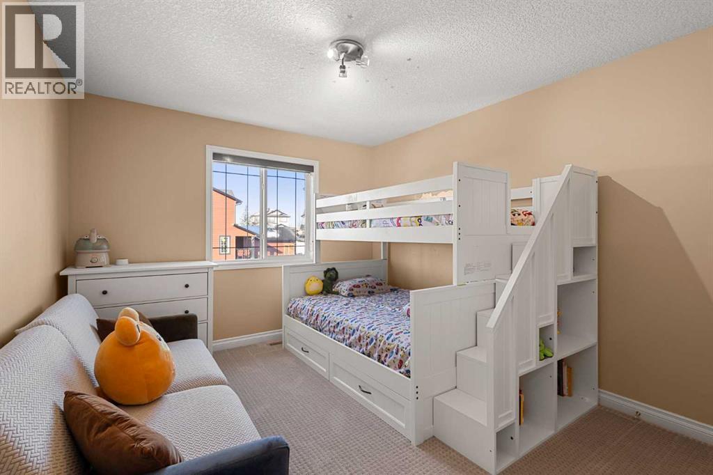 157 Hidden Creek Road Nw, Calgary, AB - Indoor Photo Showing Bedroom