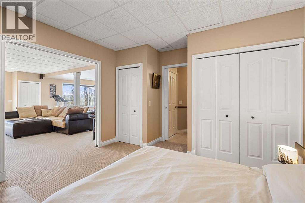 157 Hidden Creek Road Nw, Calgary, AB - Indoor Photo Showing Bedroom