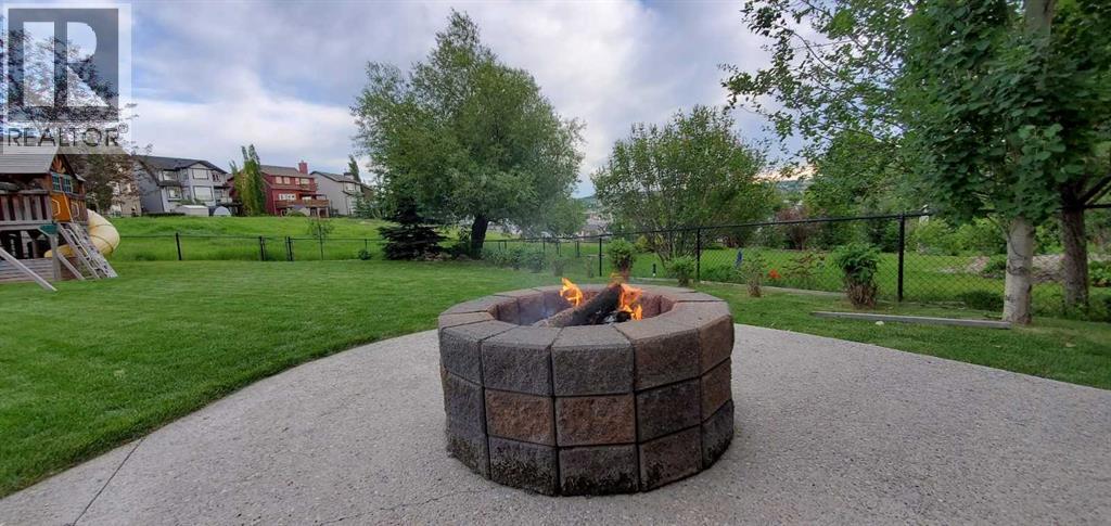 157 Hidden Creek Road Nw, Calgary, AB - Outdoor With Backyard