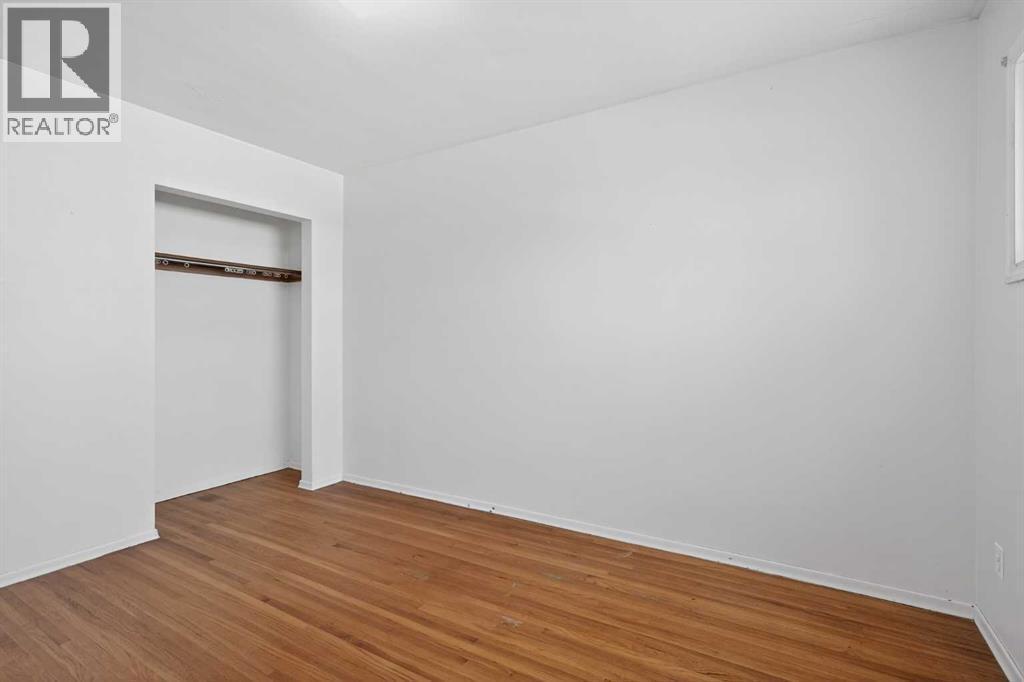 44 Winslow Crescent Sw, Calgary, AB - Indoor Photo Showing Other Room