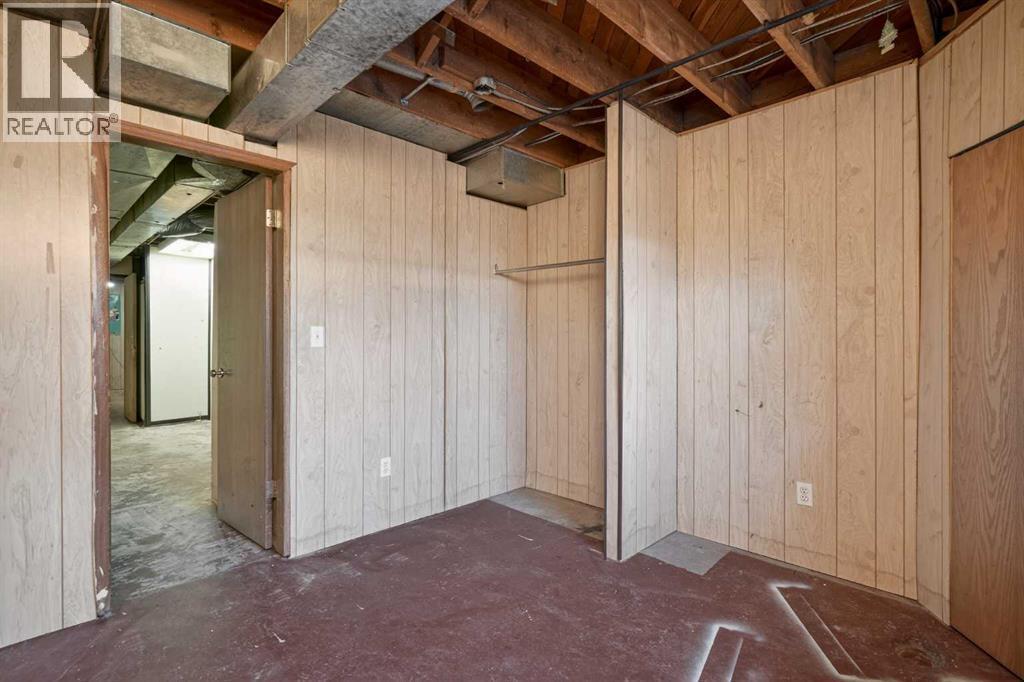 44 Winslow Crescent Sw, Calgary, AB - Indoor Photo Showing Basement