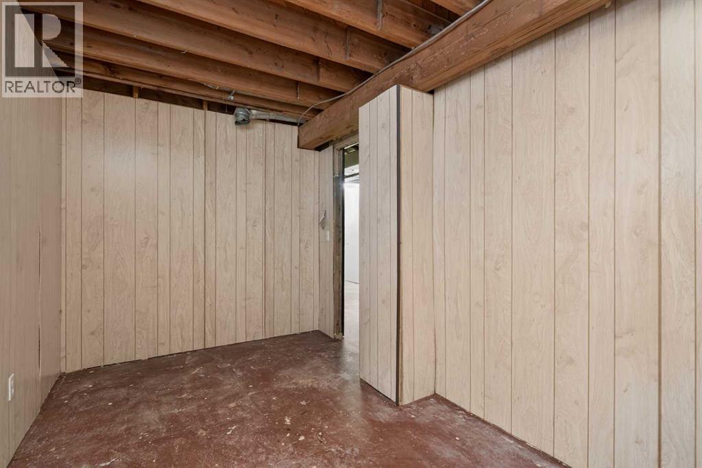 44 Winslow Crescent Sw, Calgary, AB - Indoor Photo Showing Basement