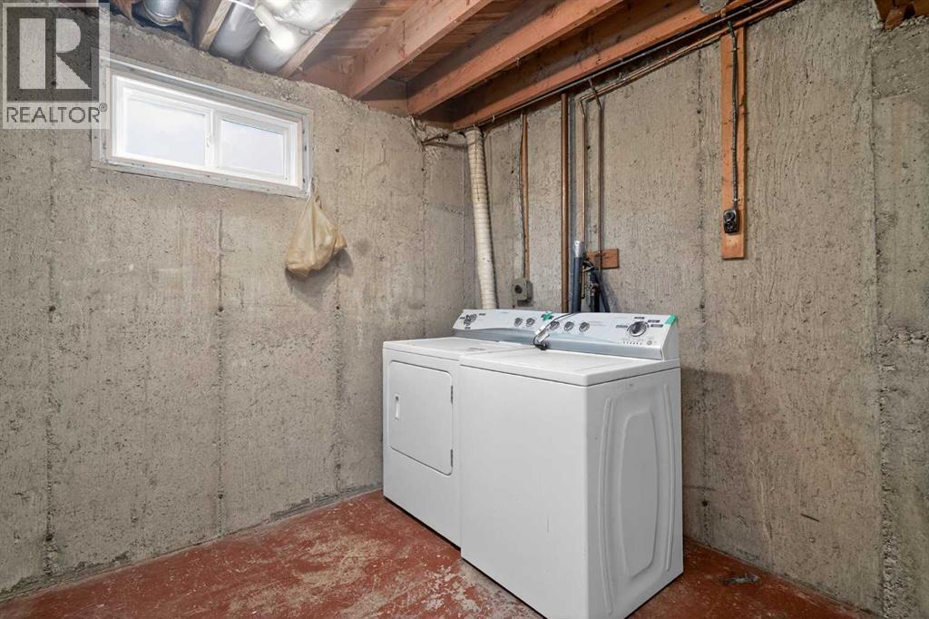 44 Winslow Crescent Sw, Calgary, AB - Indoor Photo Showing Laundry Room