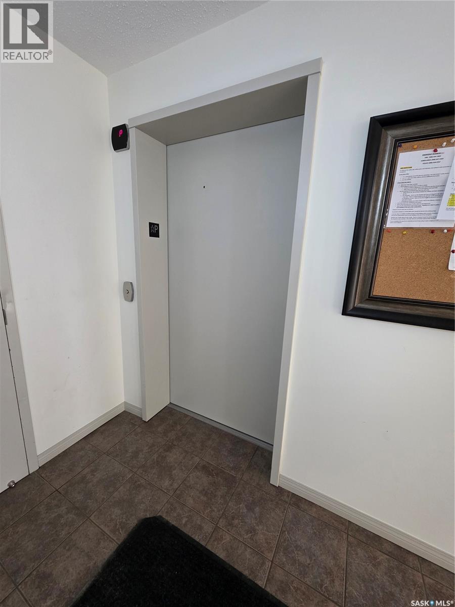 205 701 Henry Street, Estevan, SK - Indoor Photo Showing Other Room