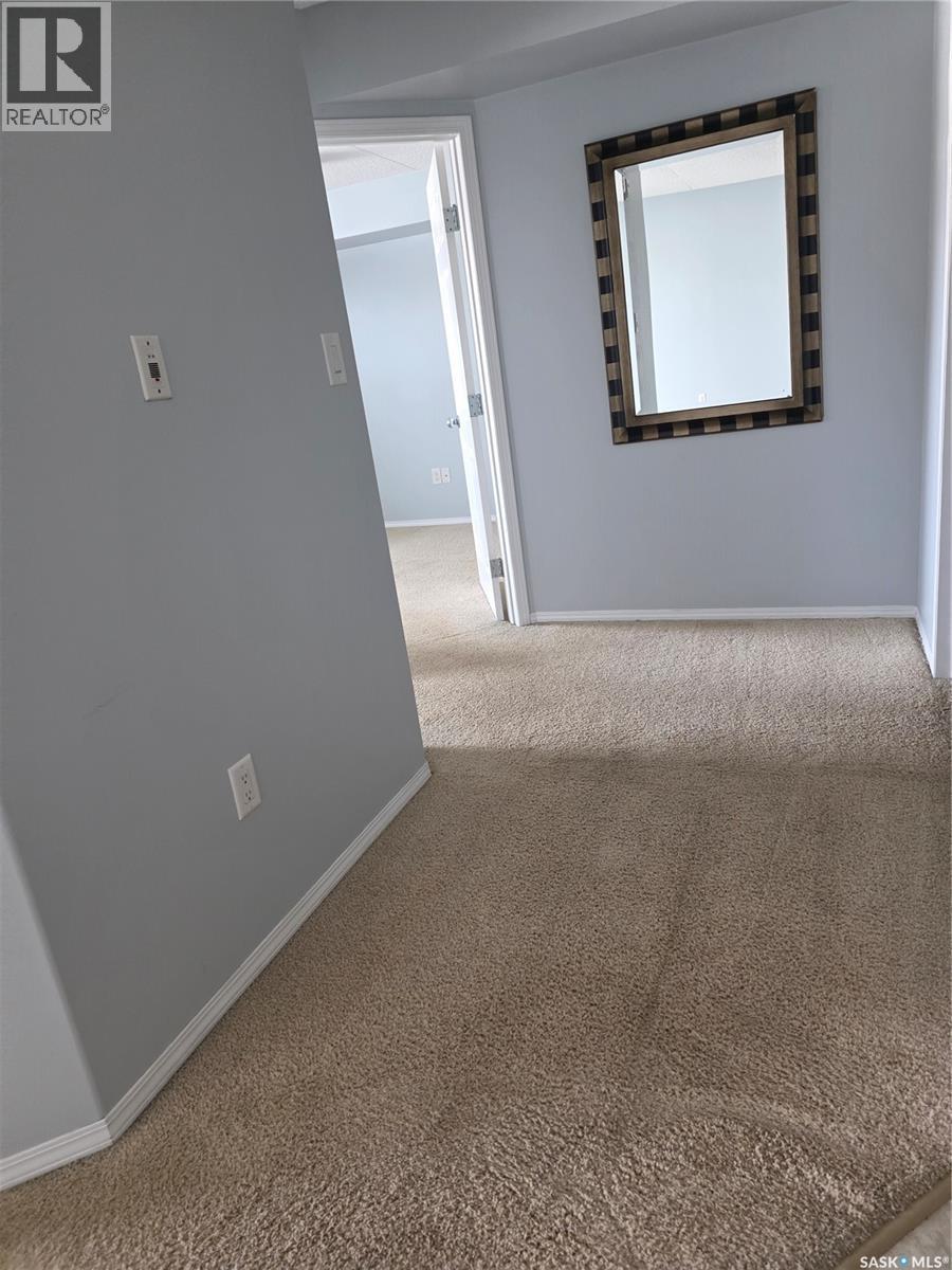 205 701 Henry Street, Estevan, SK - Indoor Photo Showing Other Room