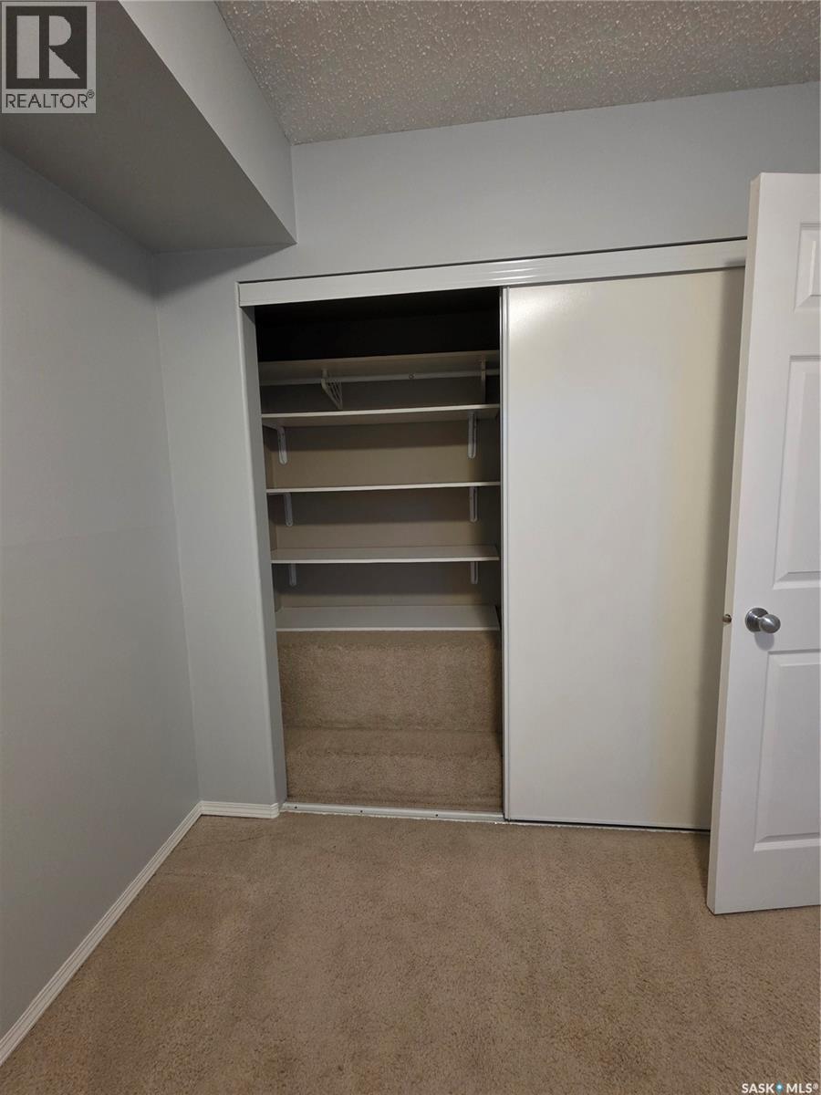 205 701 Henry Street, Estevan, SK - Indoor Photo Showing Other Room