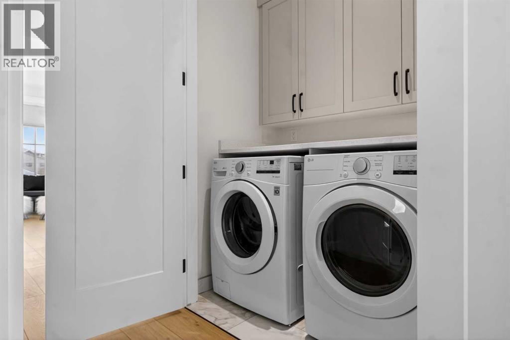 124 26 Avenue Ne, Calgary, AB - Indoor Photo Showing Laundry Room