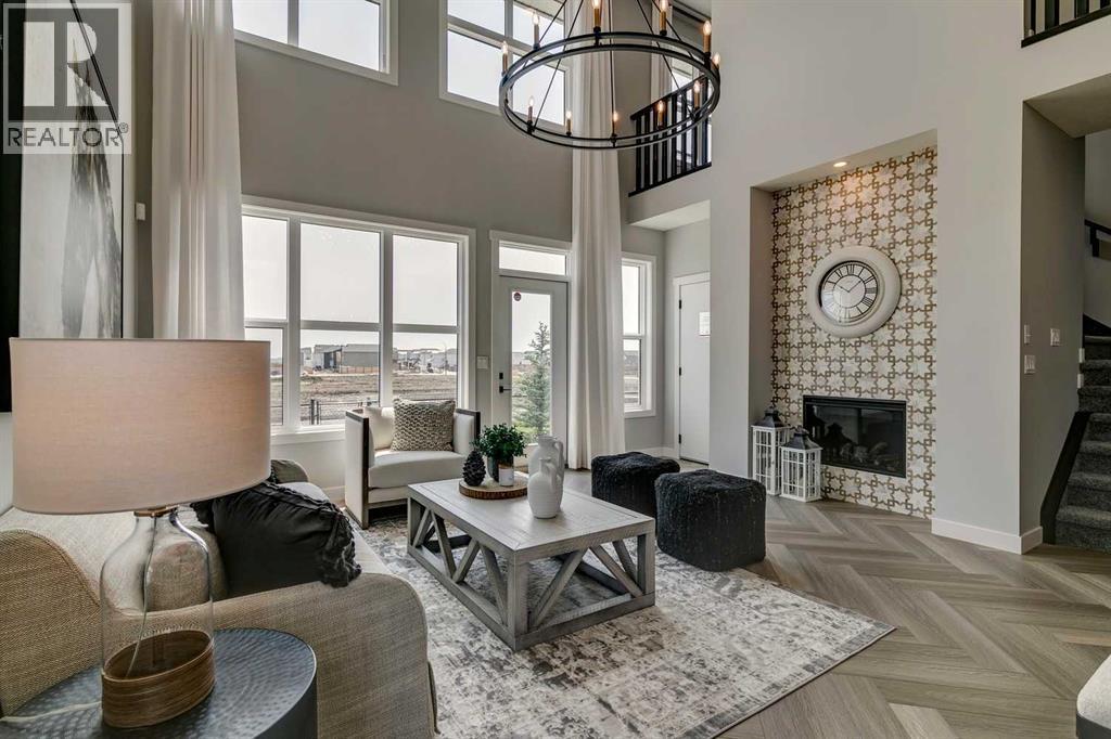 182 Setonstone Green Se, Calgary, AB - Indoor Photo Showing Living Room With Fireplace