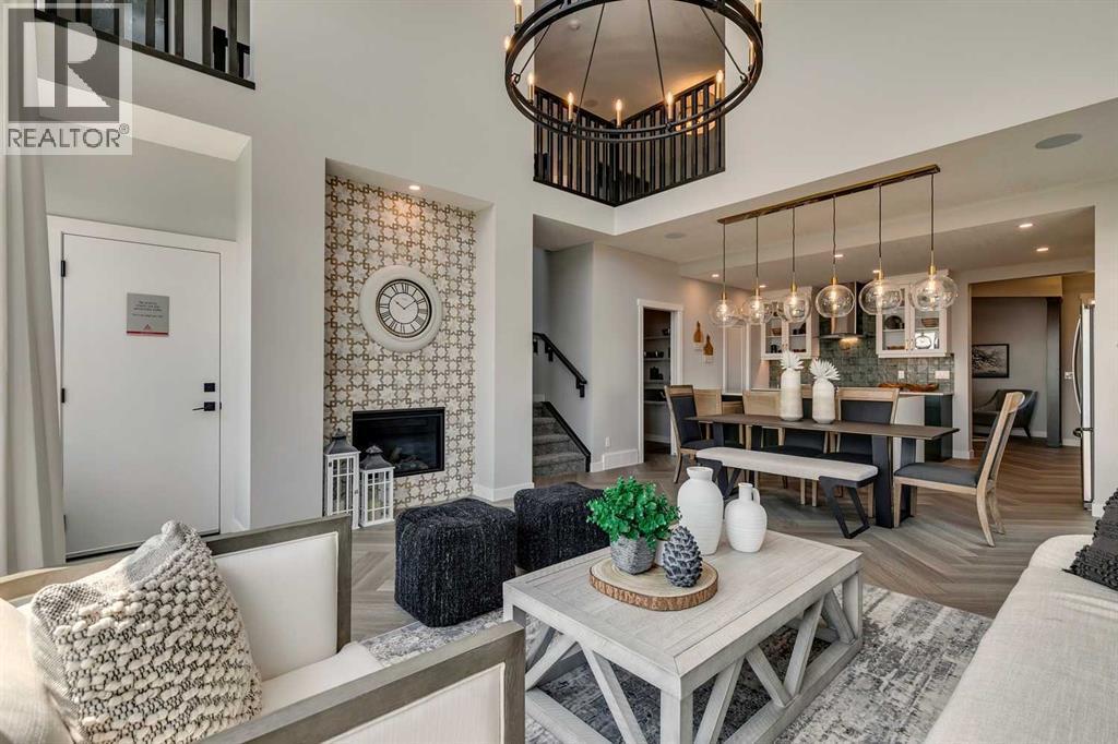 182 Setonstone Green Se, Calgary, AB - Indoor Photo Showing Living Room With Fireplace