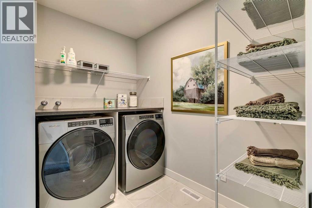 182 Setonstone Green Se, Calgary, AB - Indoor Photo Showing Laundry Room