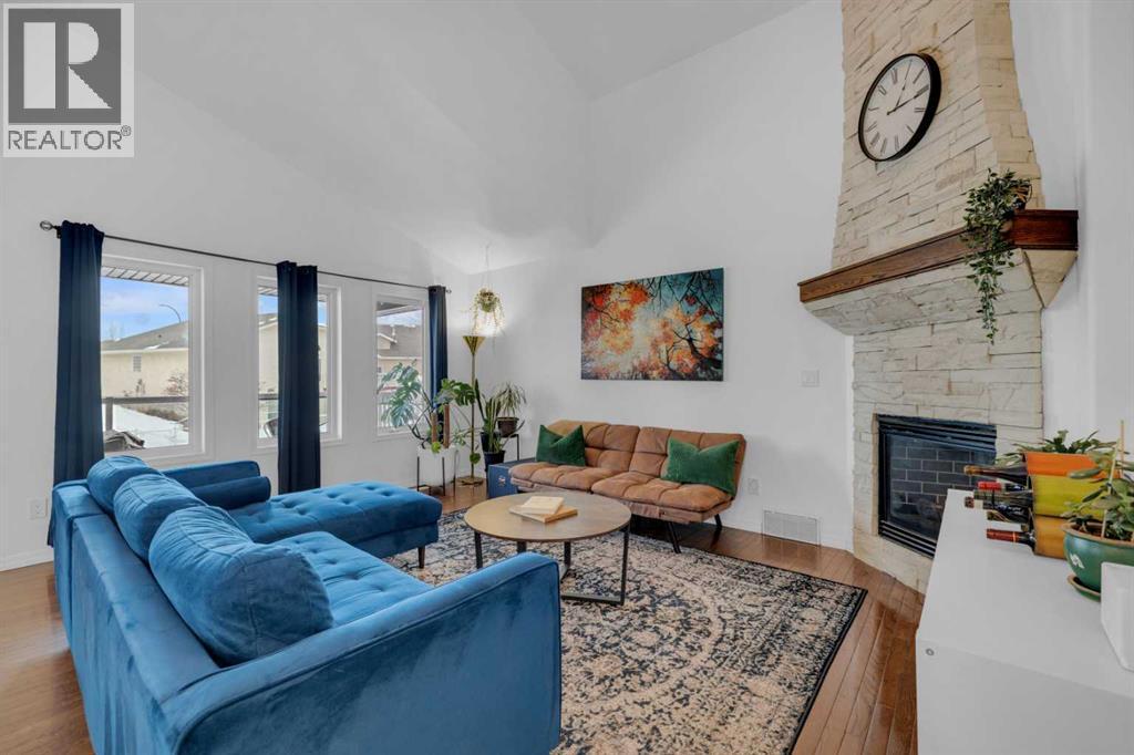 18 Lampard Crescent, Red Deer, AB - Indoor Photo Showing Living Room With Fireplace