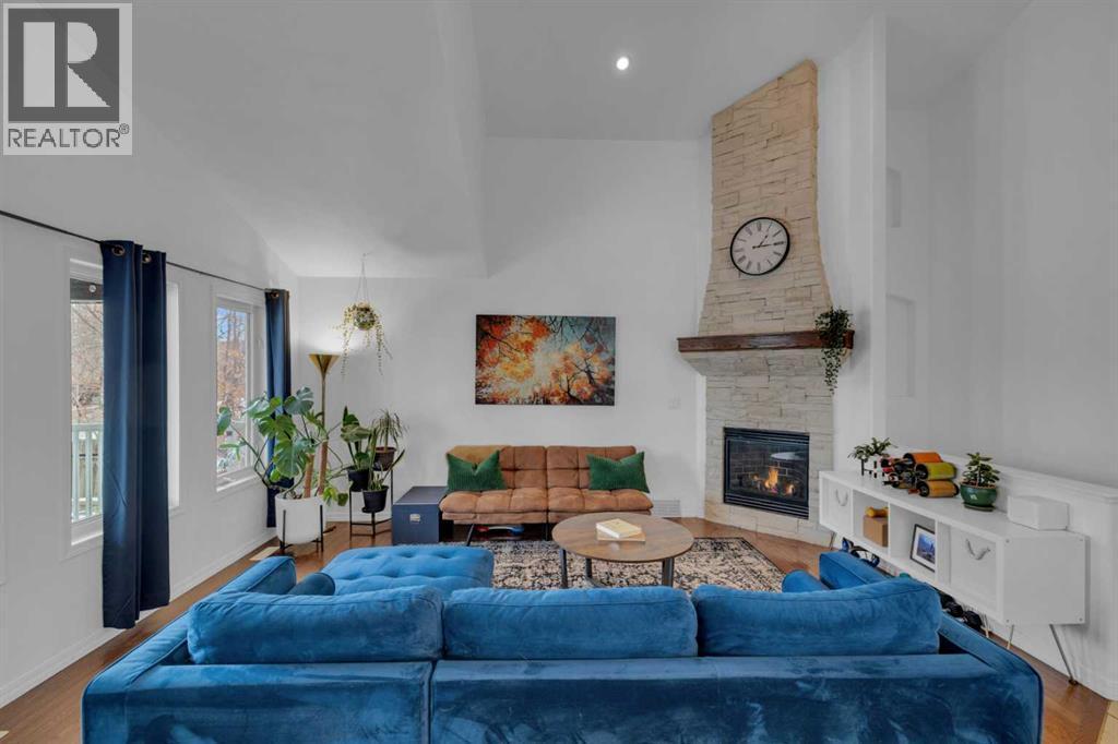 18 Lampard Crescent, Red Deer, AB - Indoor Photo Showing Living Room With Fireplace