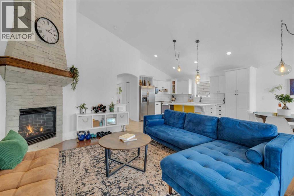 18 Lampard Crescent, Red Deer, AB - Indoor Photo Showing Living Room With Fireplace