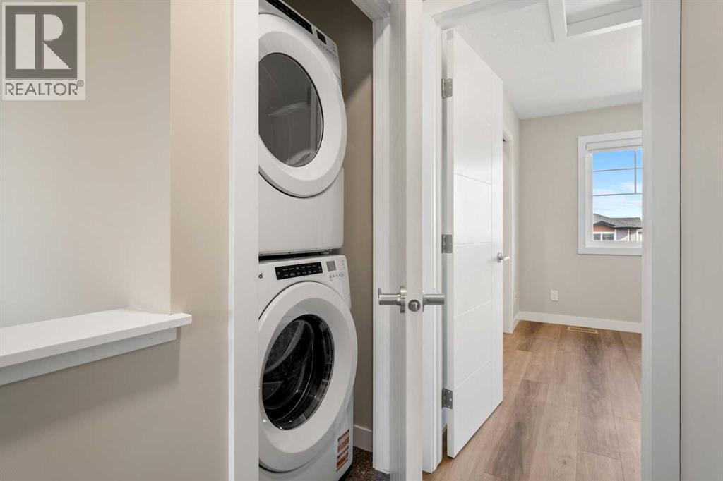 72, 285 Chelsea Court, Chestermere, AB - Indoor Photo Showing Laundry Room