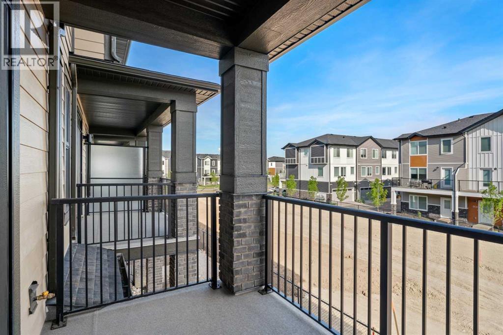 72, 285 Chelsea Court, Chestermere, AB - Outdoor With Balcony With Exterior