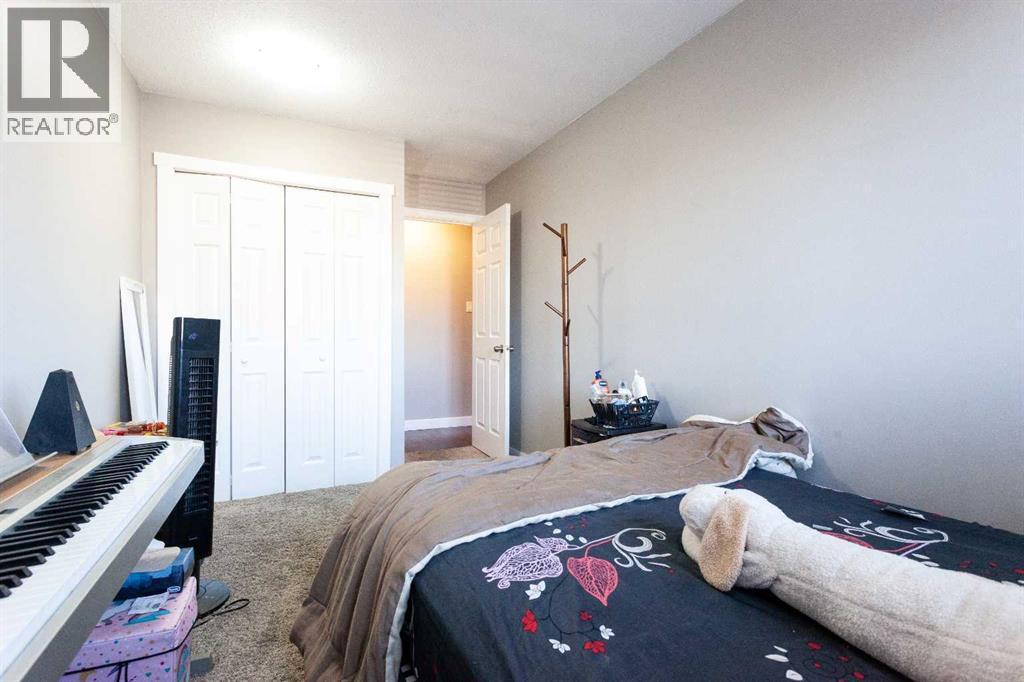 207B, 295 Columbia Boulevard W, Lethbridge, AB - Indoor Photo Showing Bedroom